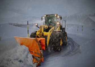 Commercial snow clearing service plowing snow 5 Ways Snow Removal Services Help Companies Improve Customer Experience