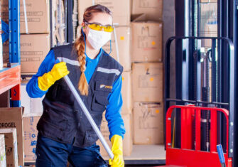 Woman cleaning a commercial space Janitorial Services Companies - How Commercial Experience Impacts Quality