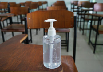 The Budd Group hand sanitizer on a university desk North Greenville University announces reopening plans for fall 2020 semester