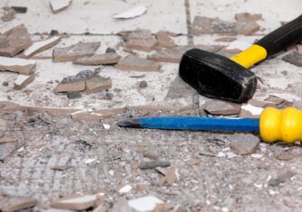 Construction on a bathroom floor How You Can Restore the Bathrooms of Your Facility with Little Interference