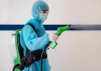 Worker using PRO-Tech's Antimicrobial Barrier Technology How PRO-Techs Antimicrobial Barrier Technology Helps Schools and Businesses Reopen Safely