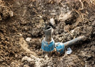 Close-up of an irrigation system pipe Top 5 Ways to Handle a Non-Working Irrigation System This Spring