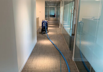 Carpet cleaner in an office building f5 Steps of Carpet Care in Your Multi-Use Office Building